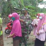Satgas TMMD 110 Bojonegoro Bantu Rapikan Antrian Pembagian Masker