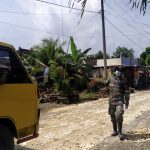 Koptu Darminto, Anggota Satgas TMMD Kodim Bojonegoro Kawal Truk Distribusikan Material