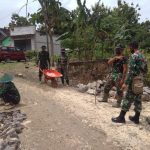 Satgas TMMD Kodim Bojonegoro Genjot Pemasangan Batu Perbaikan Jalan