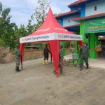 TMMD Bojonegoro, Danramil Tambakrejo Pimpin Bersih Bersih Area Balai Desa Jatimulyo