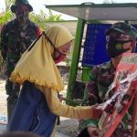 Satgas TMMD Sediakan Perpustakaan Keliling Bagi Anak anak di Tambakrejo