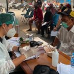 Ratusan Pedagang Lokbin Pasar Kamal Antusias Ikuti Vaksinasi COVID-19