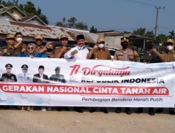 Pj Bupati Henrizal Hadiri Pembagian Ratusan Bendera Merah Putih Bersama Polres Sarolangun