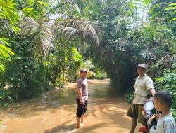Sungai Meluap, Personil Polsek Batang Asai Himbau Warga Agar Waspada